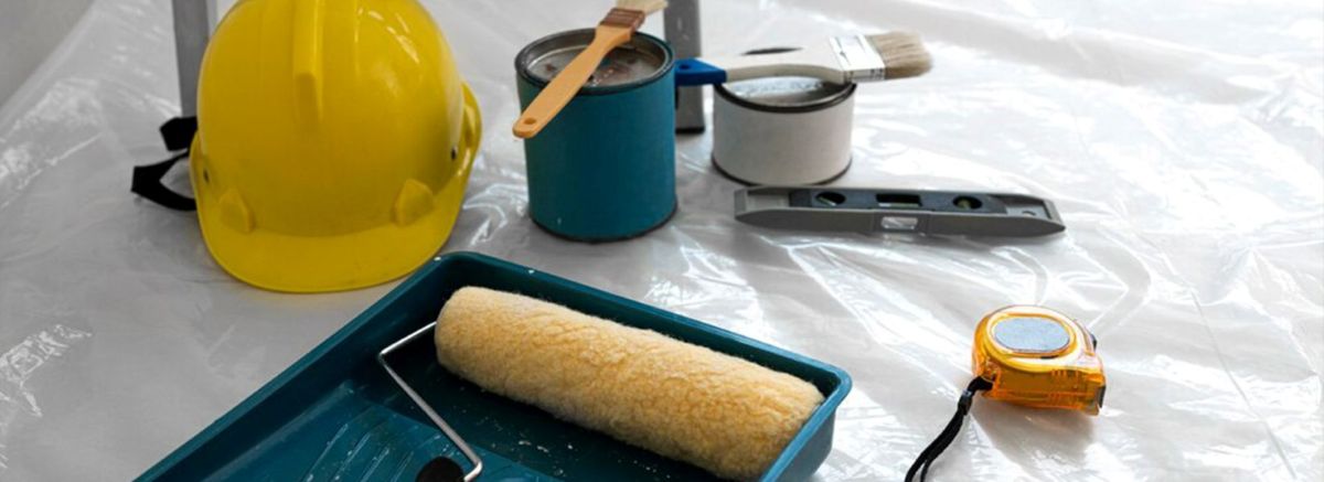 Slide cover depicting paint tools, buckets and helmet