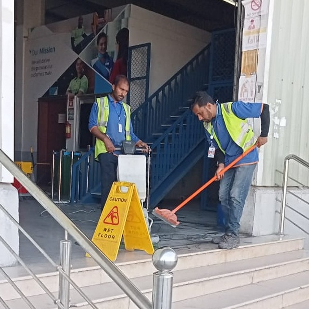  Janitorial Team carrying out cleaning tasks