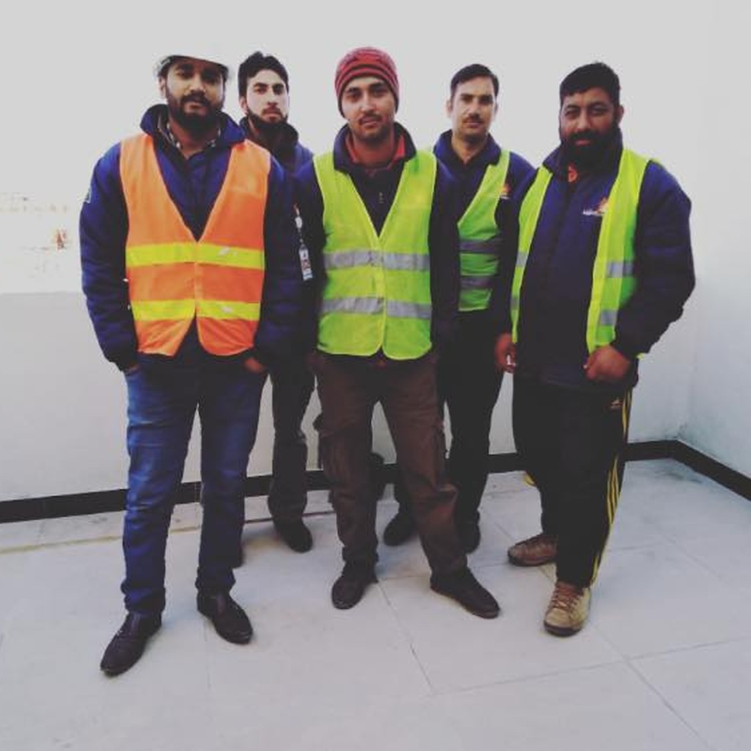 Facilities Management Team Members standing in a group photo